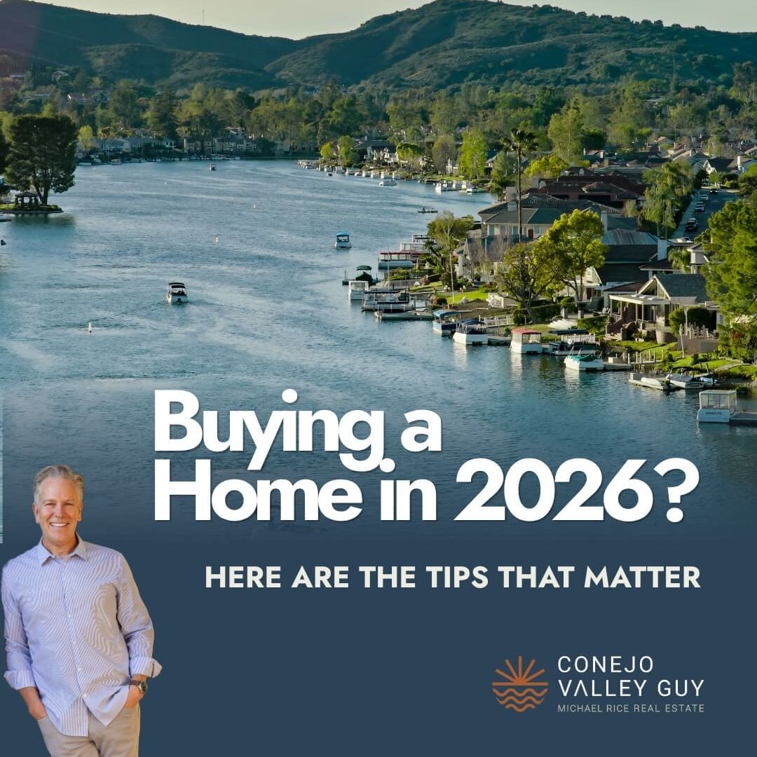 A man stands in front of a lakeside neighborhood with hills in the background. Text reads: Buying a Home in 2026? Here are the tips that matter. Conejo Valley Guy. Michael Rice Real Estate. For more resources, visit our Link In Bio Page.
