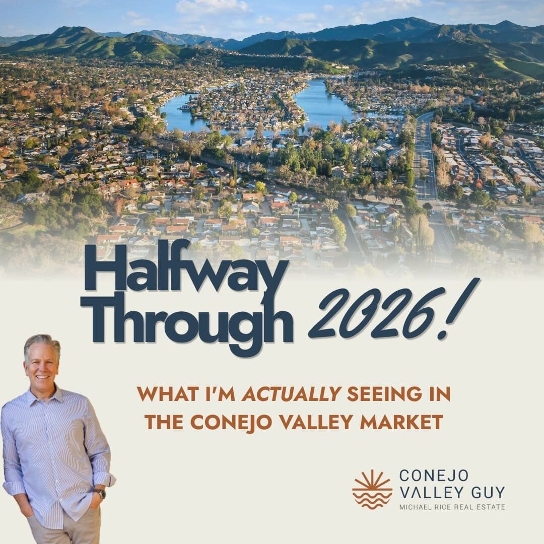 A smiling man stands next to text reading “Halfway Through 2026! What I’m actually seeing in the Conejo Valley Market” over an aerial view of a city with mountains and a lake. For an in-depth look at current trends, check out the Link In Bio.